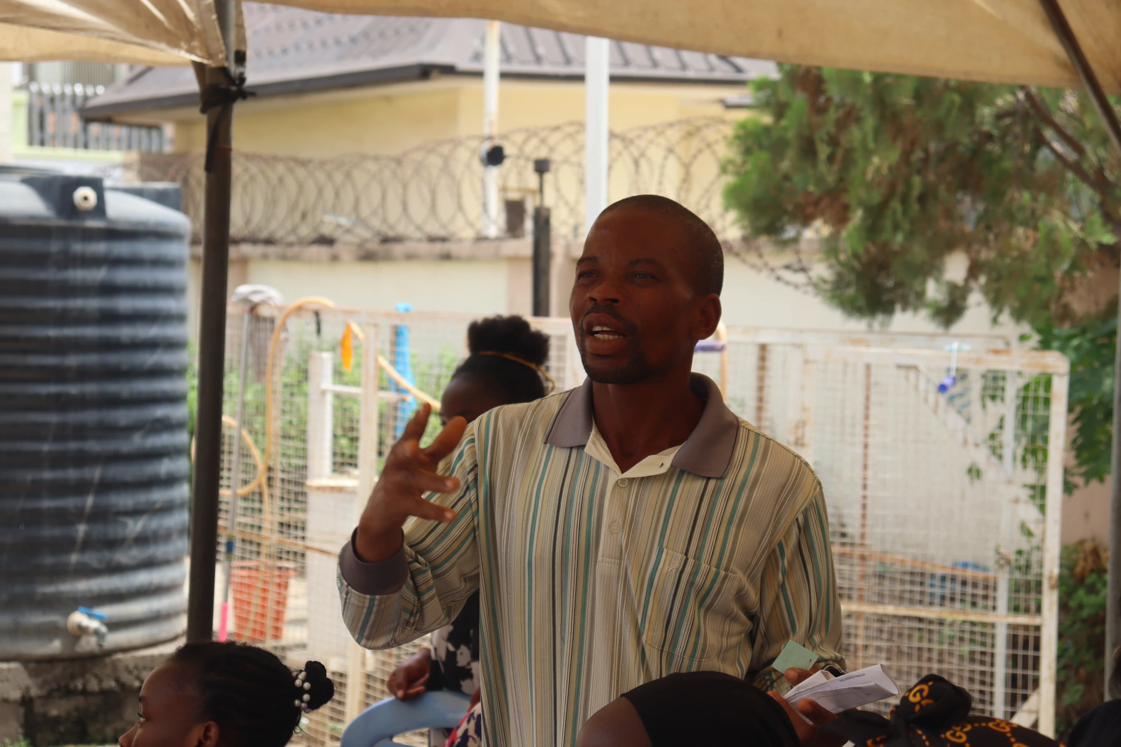 People joining hands in unity and prayer